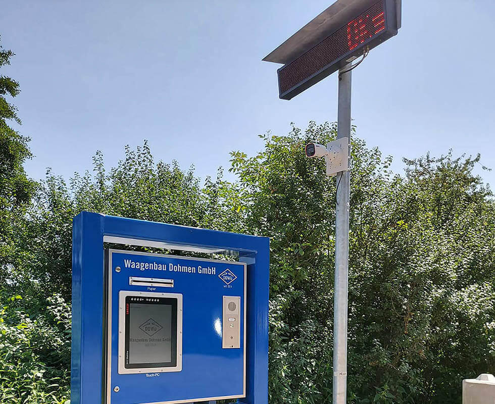 Vehicle scale with self service station